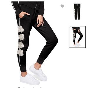 Size small embroidered pink joggers brand new